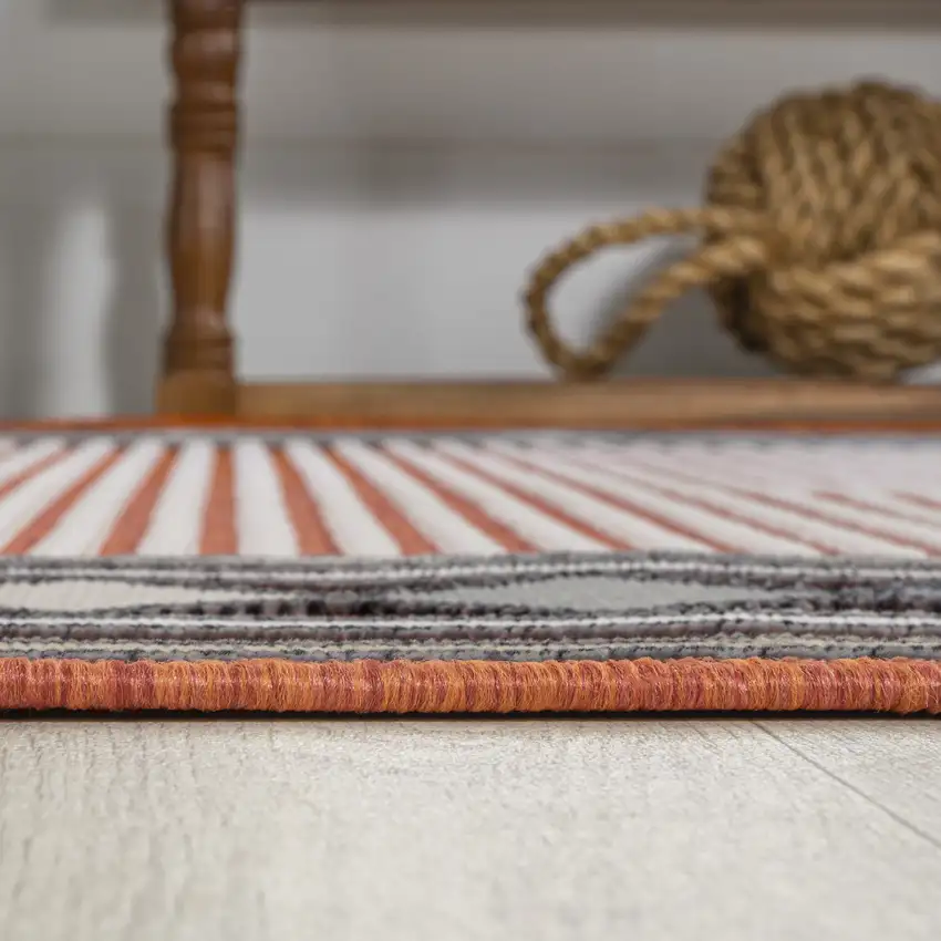 8' Orange And Ivory Geometric Indoor Outdoor Runner Rug Photo 9