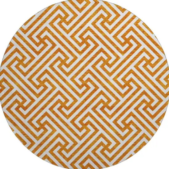 8' Orange And Ivory Geometric Washable Round Rug With UV Protection Photo 4