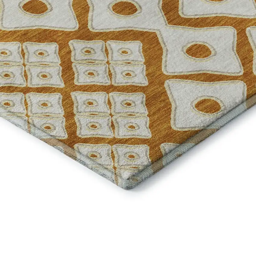 8' Orange And Ivory Geometric Washable Round Rug With UV Protection Photo 8