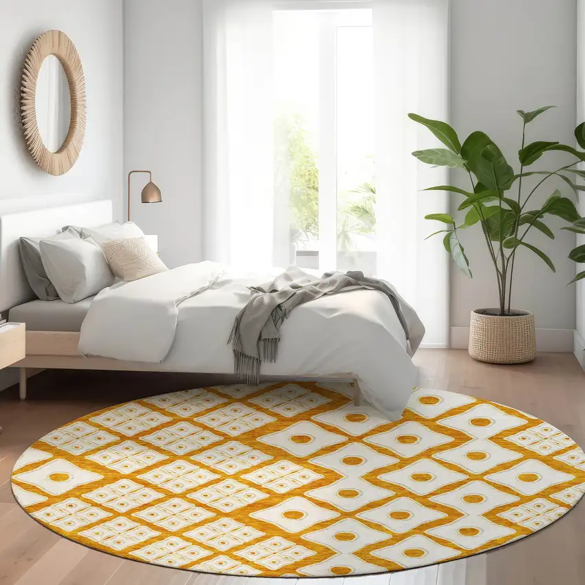 8' Orange And Ivory Geometric Washable Round Rug With UV Protection Photo 6
