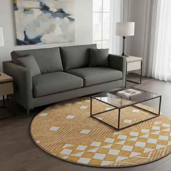 8' Orange And Ivory Geometric Washable Round Rug With UV Protection Photo 2