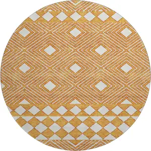Photo of 8' Orange And Ivory Geometric Washable Round Rug With UV Protection