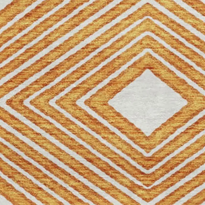 8' Orange And Ivory Geometric Washable Round Rug With UV Protection Photo 4