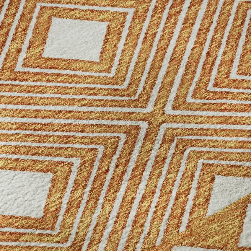 8' Orange And Ivory Geometric Washable Round Rug With UV Protection Photo 9