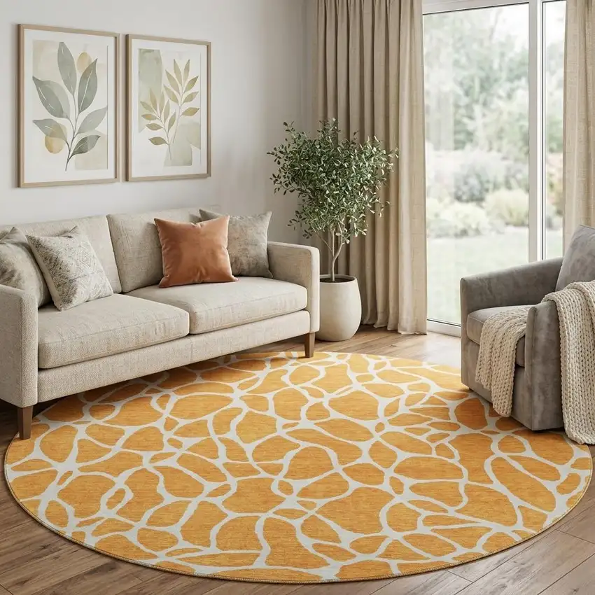 8' Orange And Ivory Geometric Washable Round Rug With UV Protection Photo 1