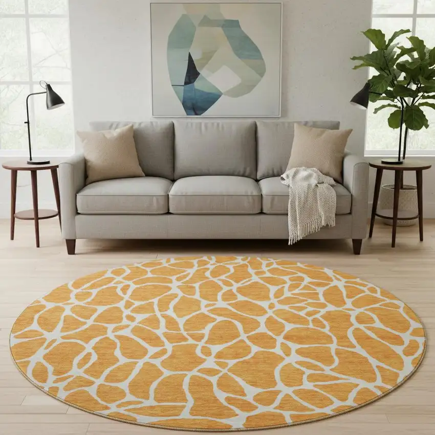 8' Orange And Ivory Geometric Washable Round Rug With UV Protection Photo 2