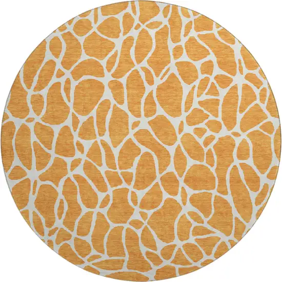 8' Orange And Ivory Geometric Washable Round Rug With UV Protection Photo 1