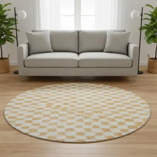 8' Orange And Ivory Geometric Washable Round Rug With UV Protection Photo 2