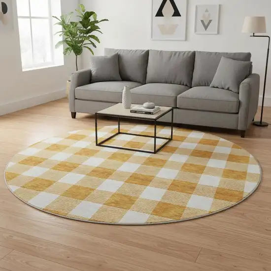 8' Orange And Ivory Plaid Washable Round Rug With UV Protection Photo 2