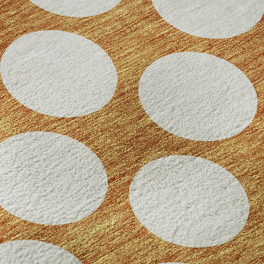 8' Orange And Ivory Polka Dot Washable Round Rug With UV Protection Photo 8