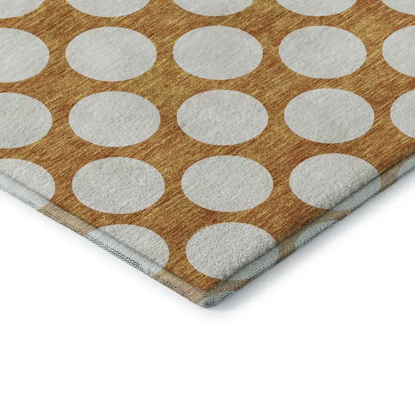 8' Orange And Ivory Polka Dot Washable Round Rug With UV Protection Photo 6