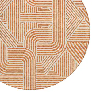 Photo of 8' Orange And Ivory Round Abstract Washable Indoor Outdoor Area Rug