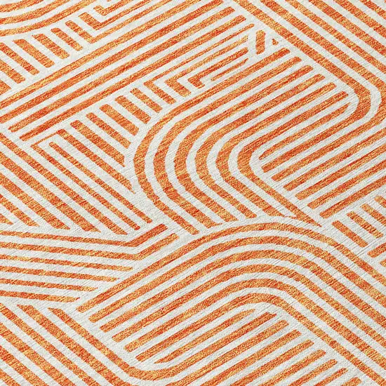 8' Orange And Ivory Round Abstract Washable Indoor Outdoor Area Rug Photo 4