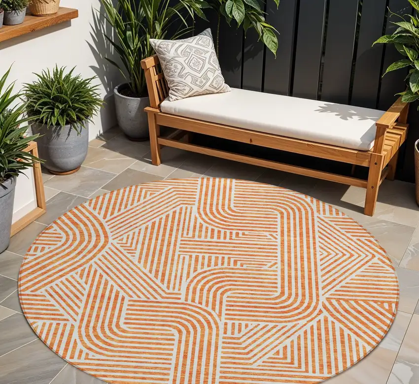 8' Orange And Ivory Round Abstract Washable Indoor Outdoor Area Rug Photo 1