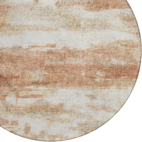 8' Orange And Ivory Round Abstract Washable Indoor Outdoor Area Rug Photo 5