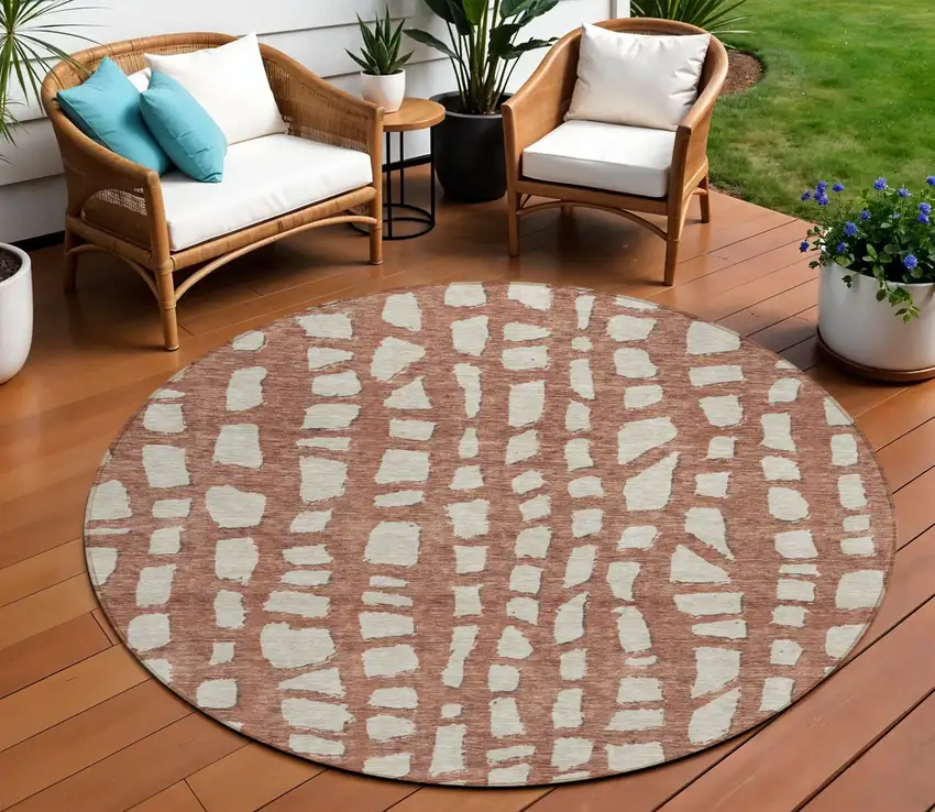 8' Orange And Ivory Round Abstract Washable Indoor Outdoor Area Rug Photo 1