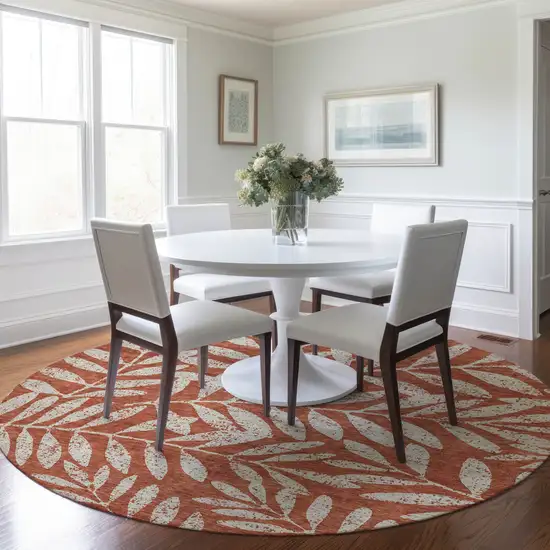 8' Orange And Ivory Round Floral Washable Indoor Outdoor Area Rug Photo 8