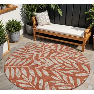 Photo of 8' Orange And Ivory Round Floral Washable Indoor Outdoor Area Rug