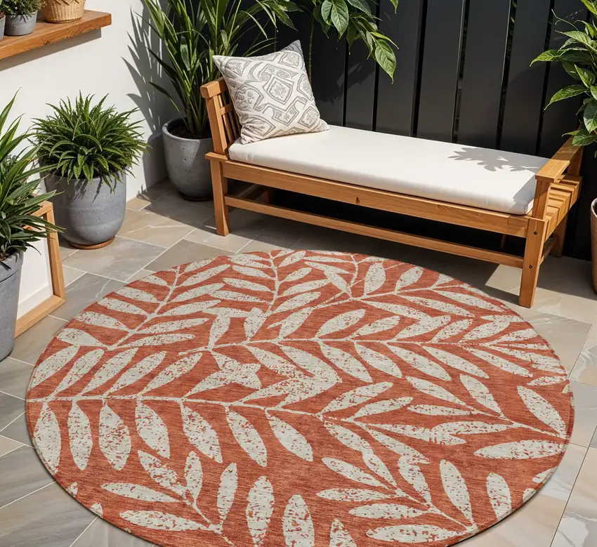 8' Orange And Ivory Round Floral Washable Indoor Outdoor Area Rug Photo 1