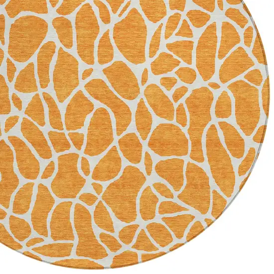 8' Orange And Ivory Round Geometric Washable Indoor Outdoor Area Rug Photo 4