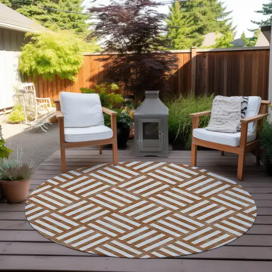 8' Orange And Ivory Round Geometric Washable Indoor Outdoor Area Rug Photo 7