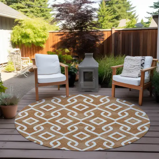 8' Orange And Ivory Round Geometric Washable Indoor Outdoor Area Rug Photo 6
