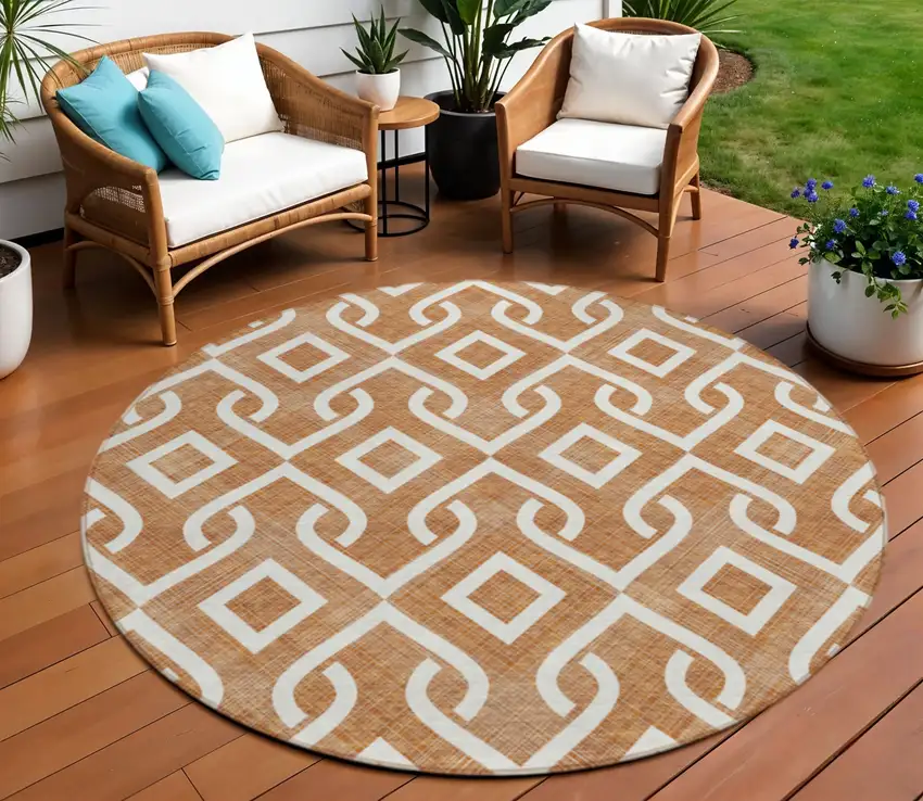 8' Orange And Ivory Round Geometric Washable Indoor Outdoor Area Rug Photo 1