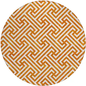 Photo of 8' Orange And Ivory Round Geometric Washable Indoor Outdoor Area Rug