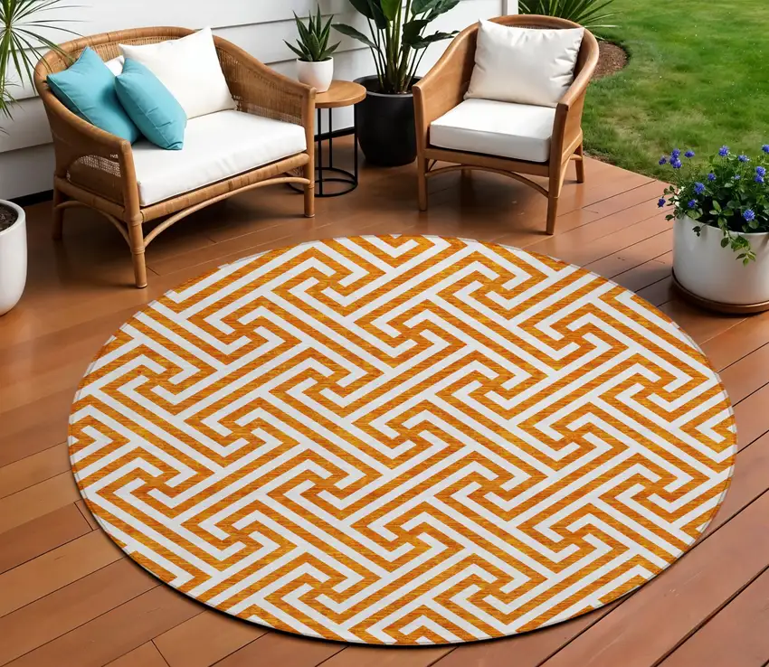 8' Orange And Ivory Round Geometric Washable Indoor Outdoor Area Rug Photo 1