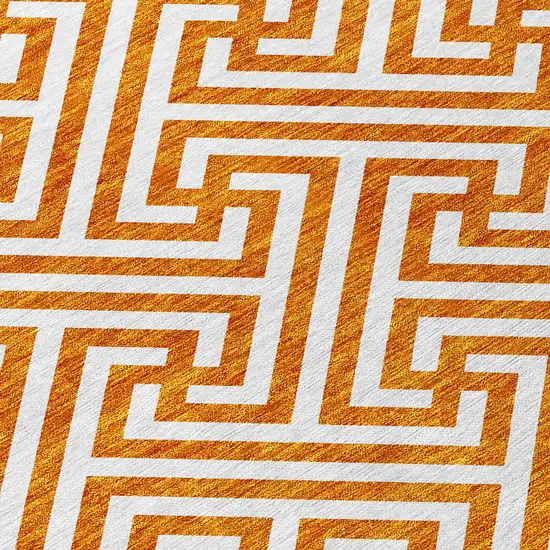 8' Orange And Ivory Round Geometric Washable Indoor Outdoor Area Rug Photo 5