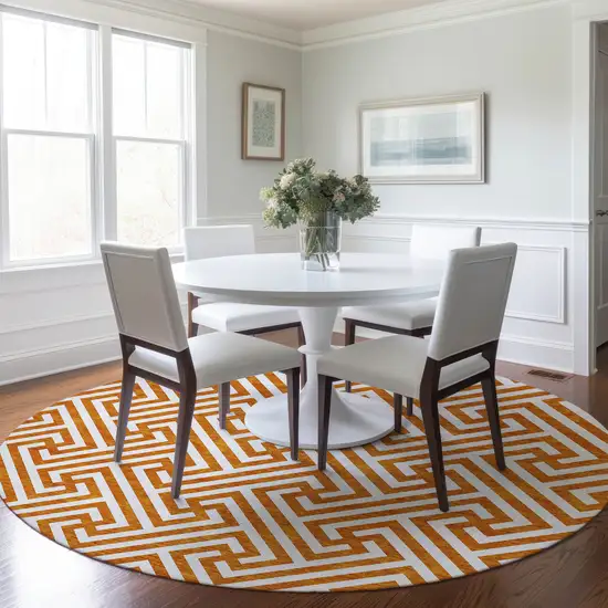 8' Orange And Ivory Round Geometric Washable Indoor Outdoor Area Rug Photo 8
