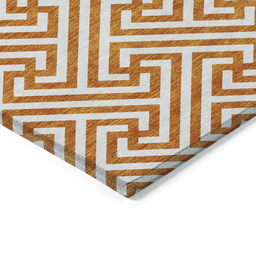 8' Orange And Ivory Round Geometric Washable Indoor Outdoor Area Rug Photo 3