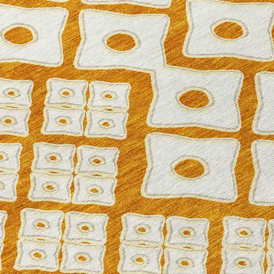8' Orange And Ivory Round Geometric Washable Indoor Outdoor Area Rug Photo 4