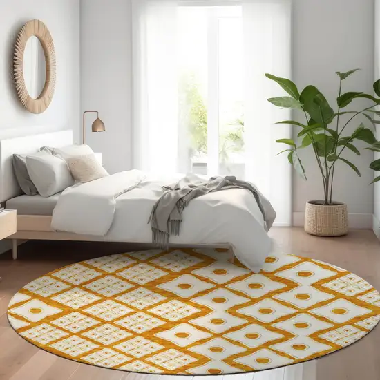 8' Orange And Ivory Round Geometric Washable Indoor Outdoor Area Rug Photo 8