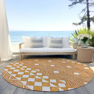 Photo of 8' Orange And Ivory Round Geometric Washable Indoor Outdoor Area Rug