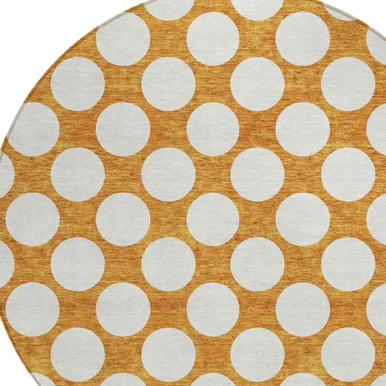 8' Orange And Ivory Round Polka Dot Washable Indoor Outdoor Area Rug Photo 4