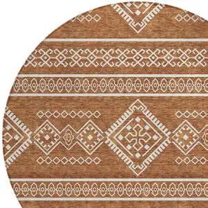 Photo of 8' Orange And Ivory Round Southwestern Washable Indoor Outdoor Area Rug