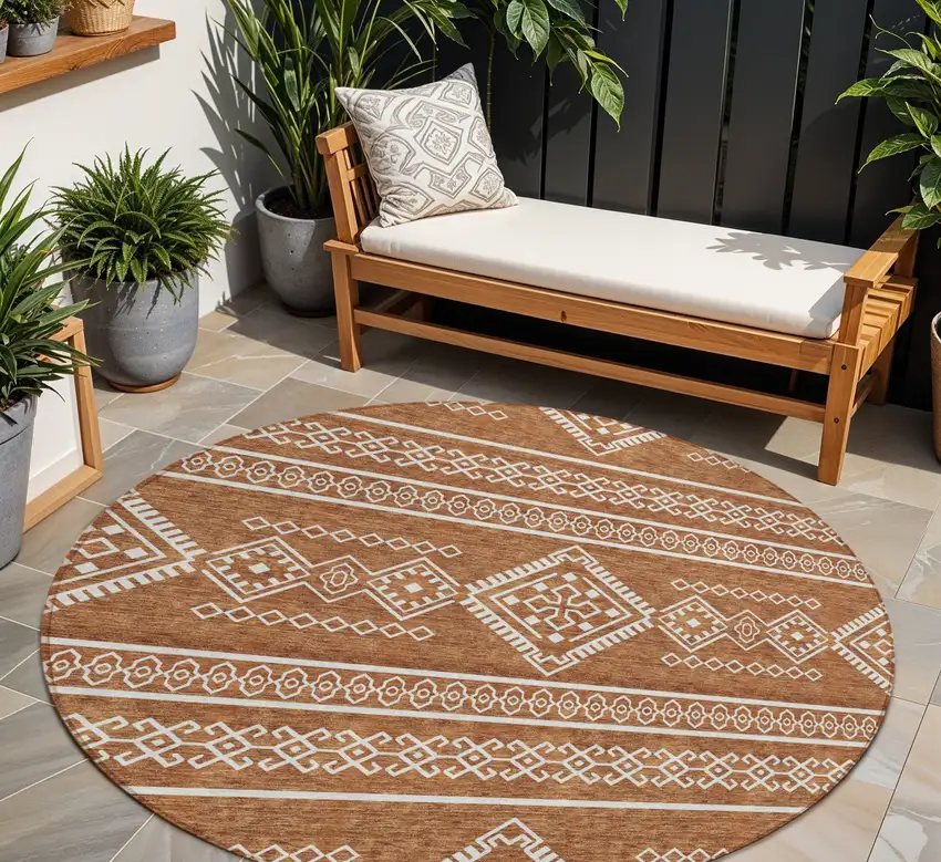 8' Orange And Ivory Round Southwestern Washable Indoor Outdoor Area Rug Photo 1