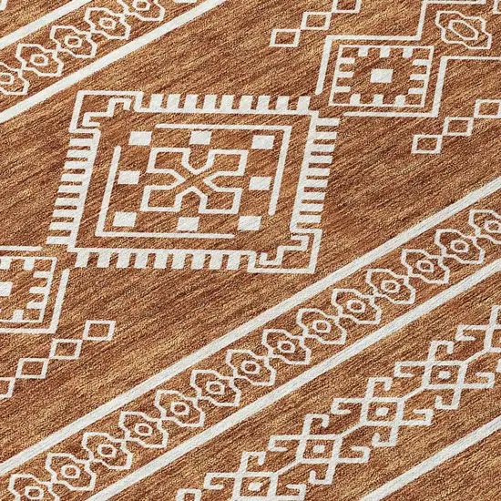 8' Orange And Ivory Round Southwestern Washable Indoor Outdoor Area Rug Photo 5