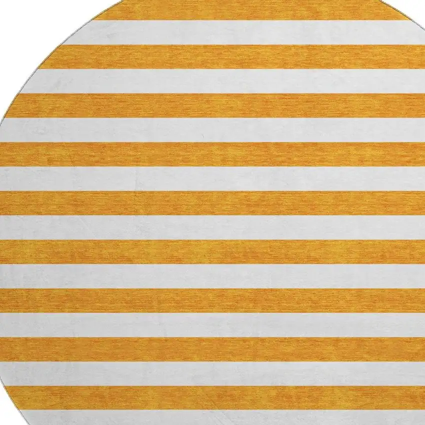 8' Orange And Ivory Striped Washable Round Rug With UV Protection Photo 3
