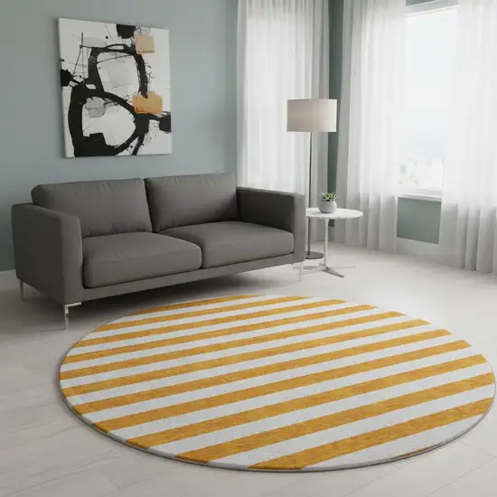 8' Orange And Ivory Striped Washable Round Rug With UV Protection Photo 2