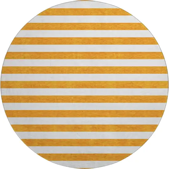 8' Orange And Ivory Striped Washable Round Rug With UV Protection Photo 1