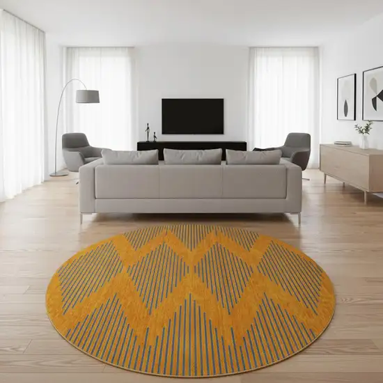 8' Orange And Navy Blue Geometric Washable Round Rug With UV Protection Photo 2