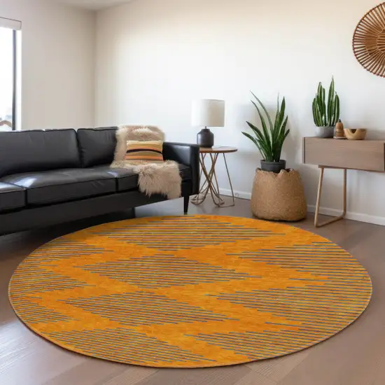 8' Orange And Navy Blue Geometric Washable Round Rug With UV Protection Photo 4