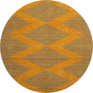 Photo of 8' Orange And Navy Blue Geometric Washable Round Rug With UV Protection