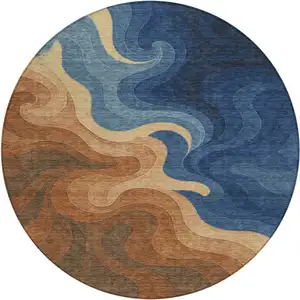 Photo of 8' Orange And Navy Blue Round Abstract Washable Indoor Outdoor Area Rug