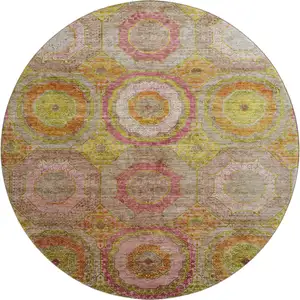 Photo of 8' Orange And Pink Geometric Washable Round Rug With UV Protection