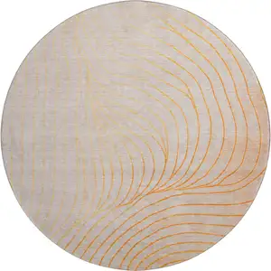 Photo of 8' Orange And Silver Abstract Washable Round Rug With UV Protection