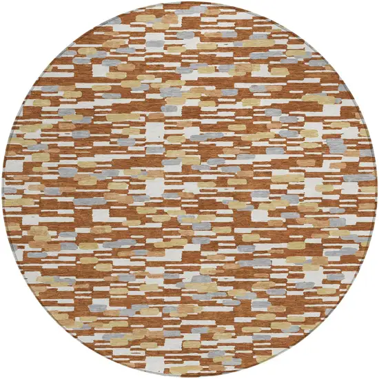 8' Orange And Silver Round Geometric Washable Indoor Outdoor Area Rug Photo 1