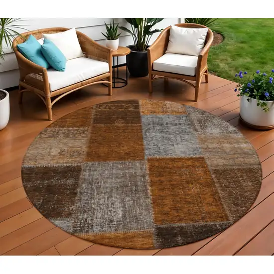 8' Orange And Taupe Round Patchwork Washable Indoor Outdoor Area Rug Photo 1